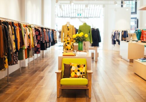 How does a dedicated fashion floor serve as a major attraction in commercial investments?